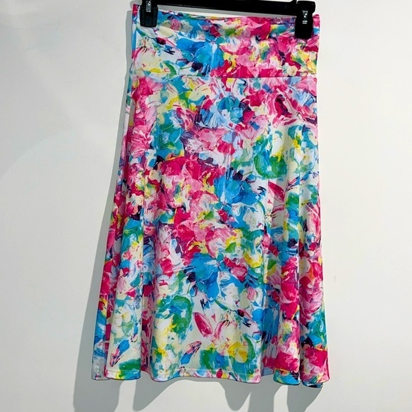 LuLaRoe Dresses & Skirts - Lularoe white pink blue green yellow floral skirt. Size XS.